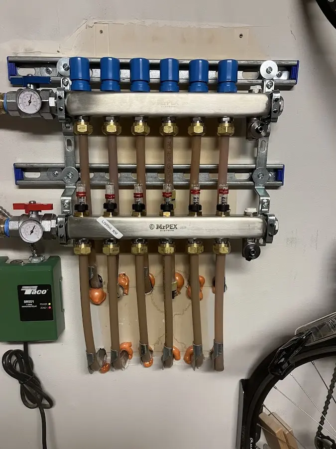 Plumber performing Water Heater Repair at a residential property in Haslet